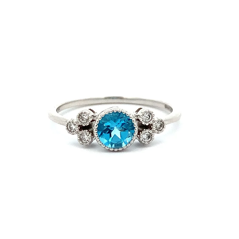 The Perfect Jewelry Piece At The Perfect Price Blue Topaz and Diamond Ring in White Gold The Perfect Jewelry Piece At The Perfect Price Blue Topaz and Diamond Ring in White Gold