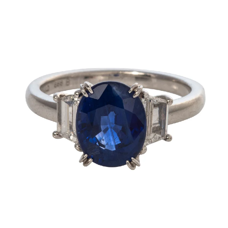 Flash Sale On Stunning Jewelry – Limited Stock Available 3.43ct Oval Sapphire & Trapezoid Diamond Three-Stone Platinum Ring