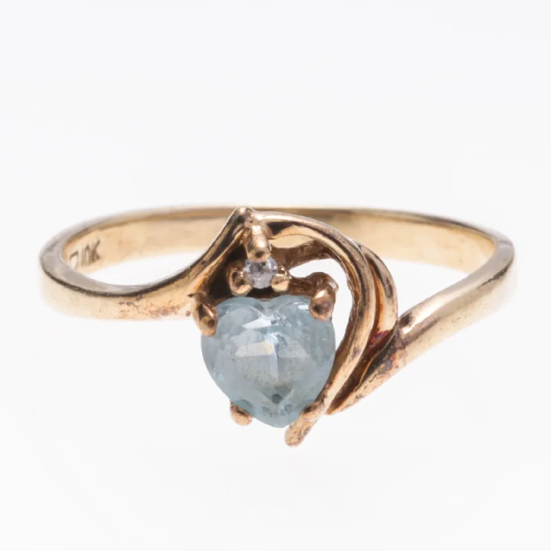 Trendy And Classic Jewelry Now At Reduced Prices 10K Yellow Gold Blue Topaz and Diamond Ring | 0.62ct, 0.005ct | SZ 5.75