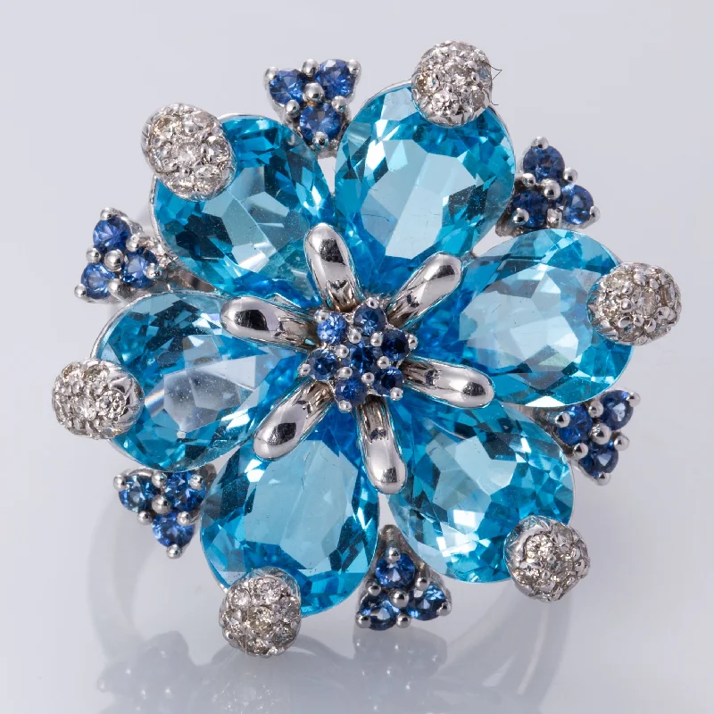 Breathtaking Jewelry, Breathtaking Prices 18K White Gold Blue Topaz, Sapphire, and Diamond Ring | 18.48 ctw, 0.42 ctw, 0.65 ctw | SZ 9 |