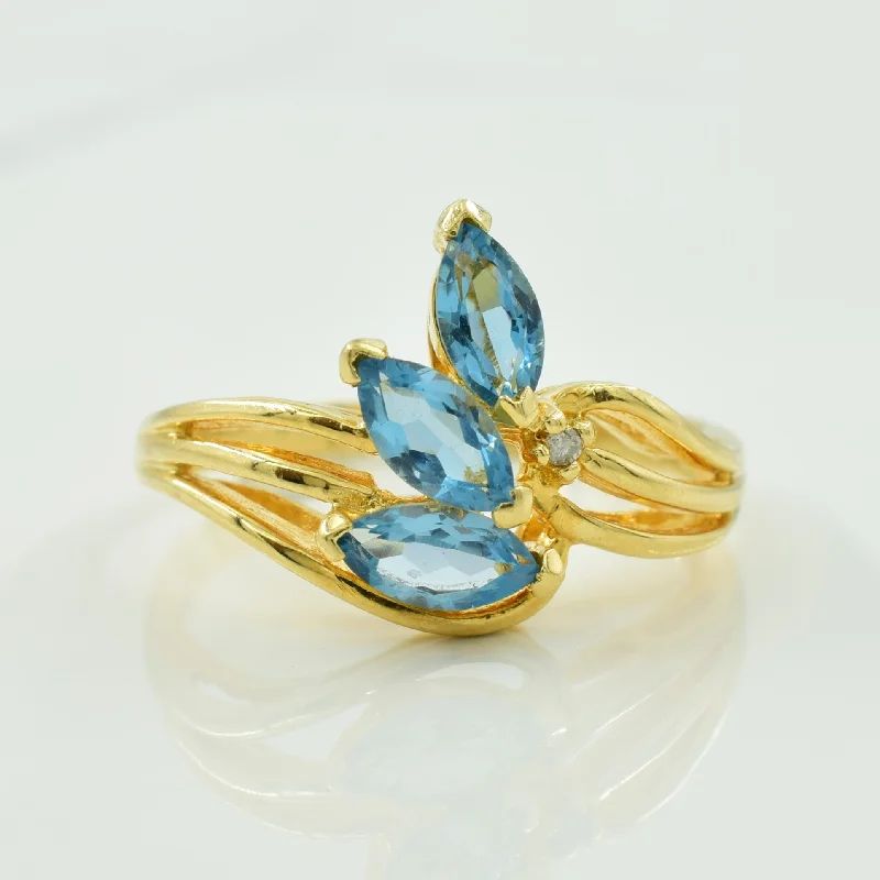 Bohemian-Inspired Jewelry For Free-Spirited Fashion Blue Topaz & Diamond Bypass Ring | 0.75ctw, 0.01ct | SZ 6.5 |