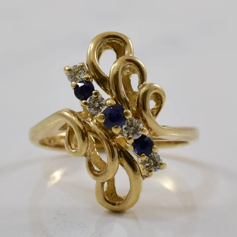 Shine Bright With Our Special Jewelry Promotions Blue Sapphire & Diamond Filigree Bypass Ring | 0.16ctw, 0.09ctw | SZ 4.75 |