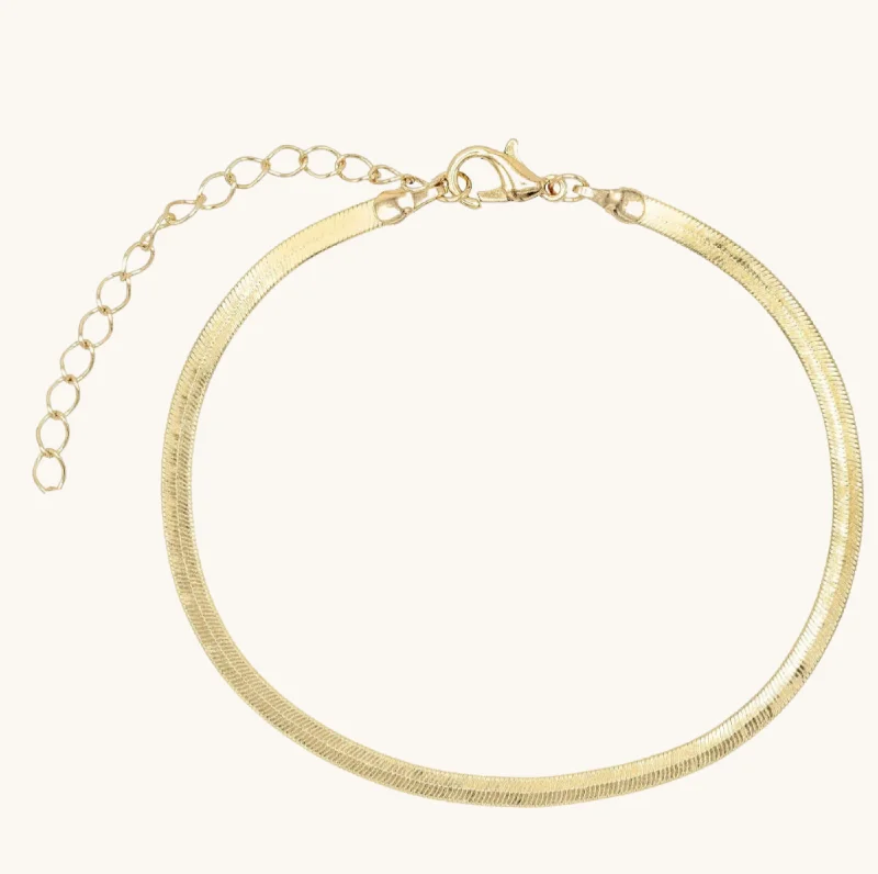 Elevate Your Outfit With Discounted Statement Jewelry Gold Herringbone Anklet