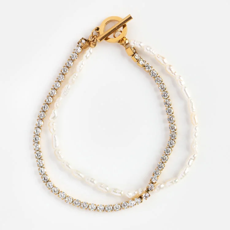 Must-Have Jewelry Pieces At Reduced Prices Pearl Glitz Layered Bracelet