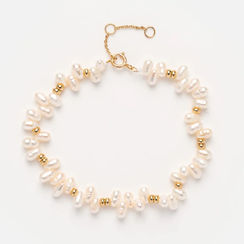 High-End Sparkle, Low-End Prices – Shop Now Solid Gold Baroque Pearl Bracelet