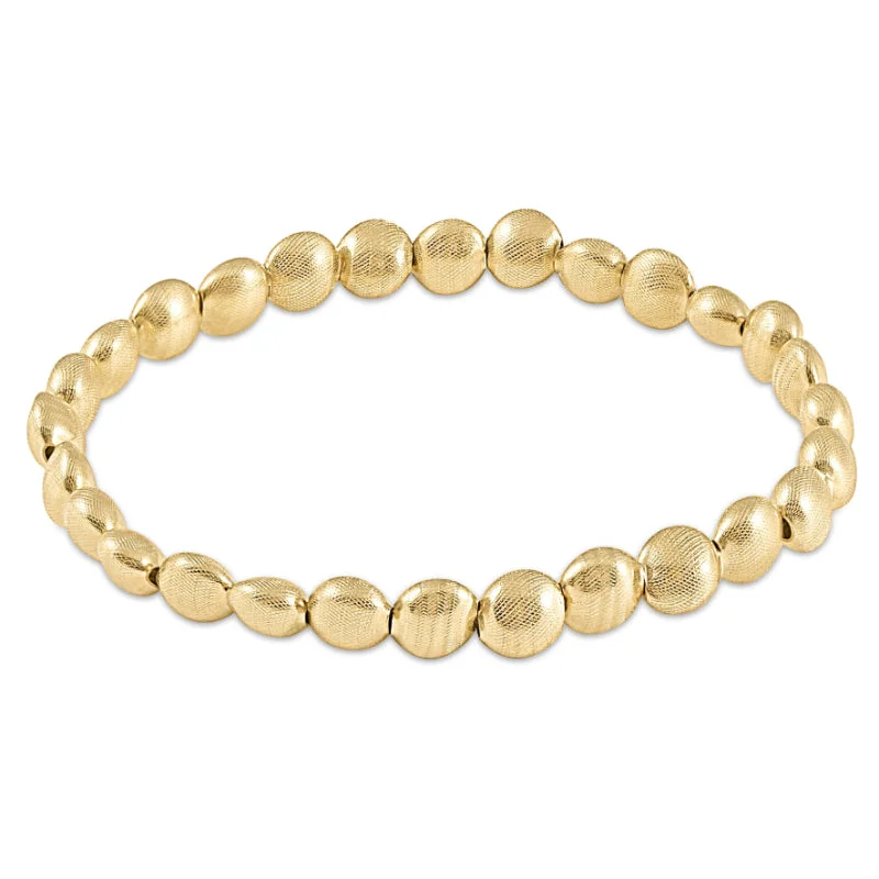 Dainty And Elegant Jewelry Now At Reduced Prices enewton 7.25" extends Honesty Gold 6mm Bead Bracelet